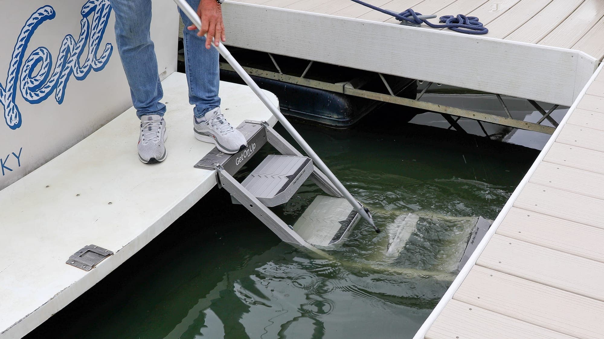 Deploying the nautiDAWGS ladder from a swim platform with a boat hook